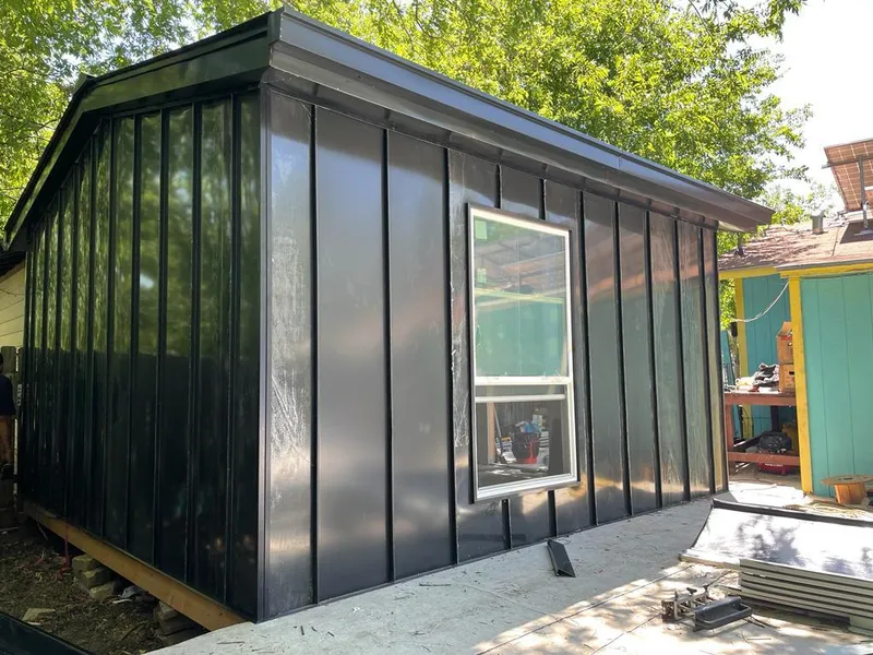 Black standing seam metal wall panels for Metal Roof Installation in Toccoa